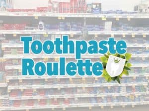Words "Toothpaste Roulette" with a background image of a large and intimidating amount of toothpaste selections at a grocery store.