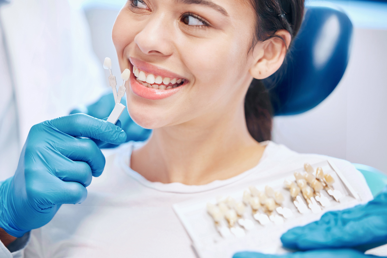 Dentist Showing Tablet Pc to Kid at Dental Clinic